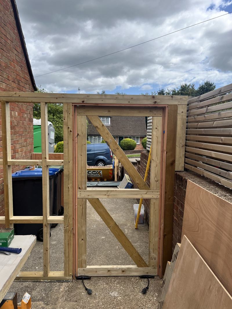 Side gate: The gate frame braced and hung, ready for boarding.