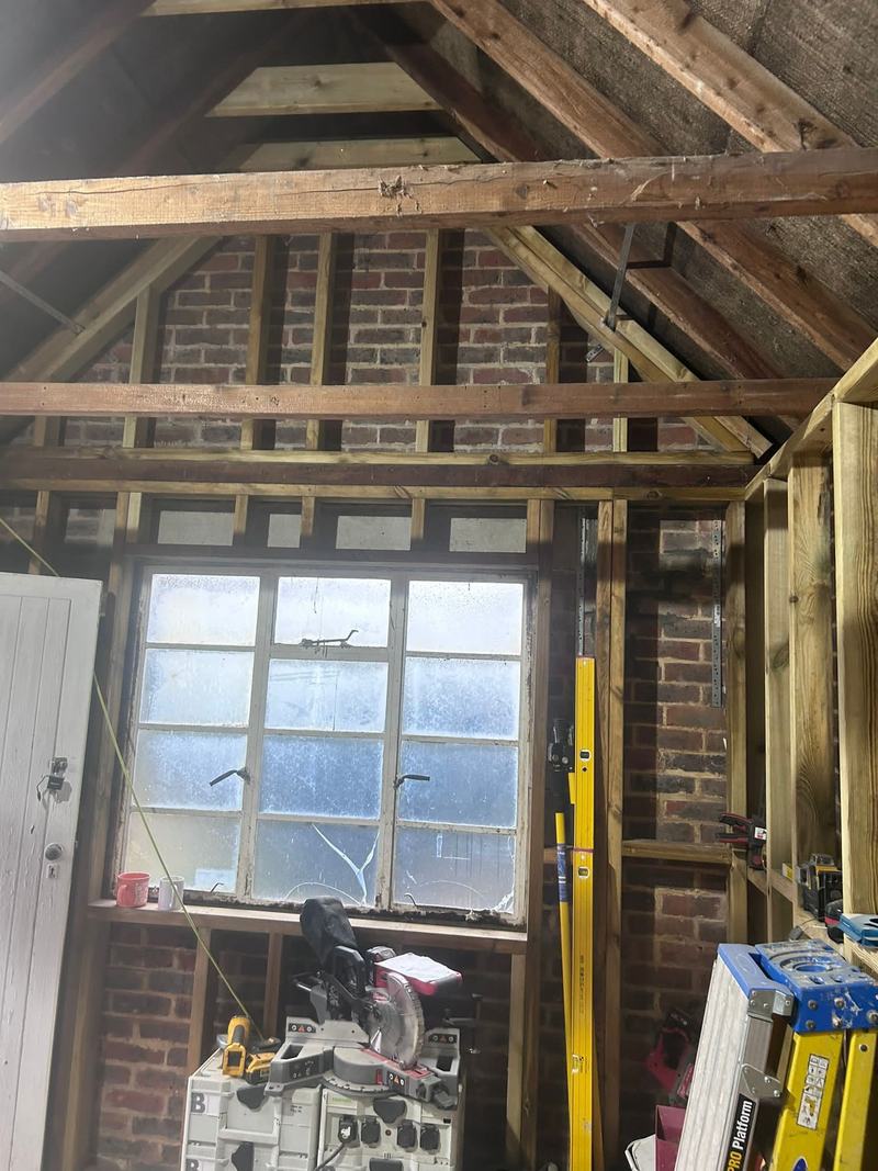 Framing: New stud walls built inside the brickwork.