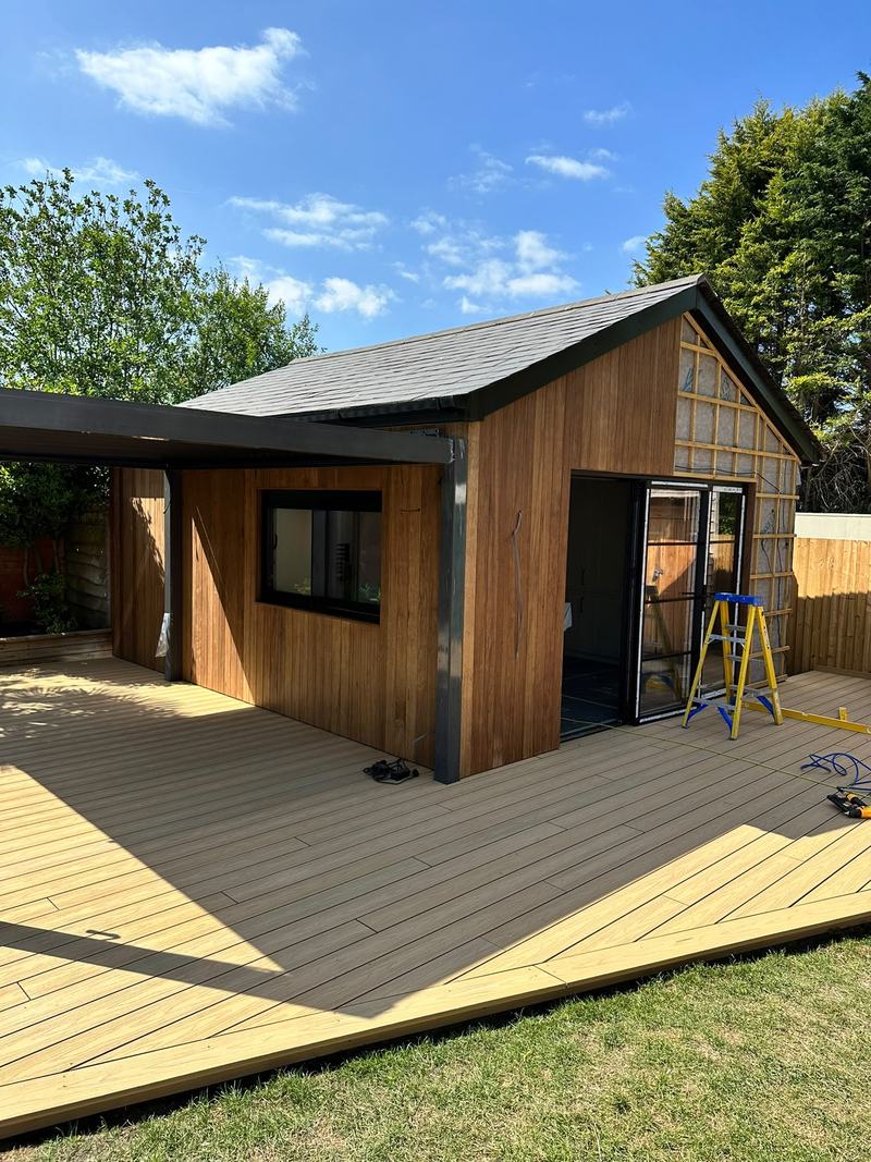 Glazing: Doors fitted, with the last of the gable cladding still to go on.