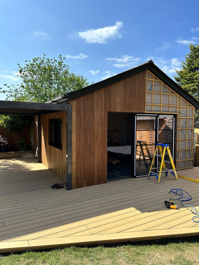Cladding: Cladding going on over the breather membrane.