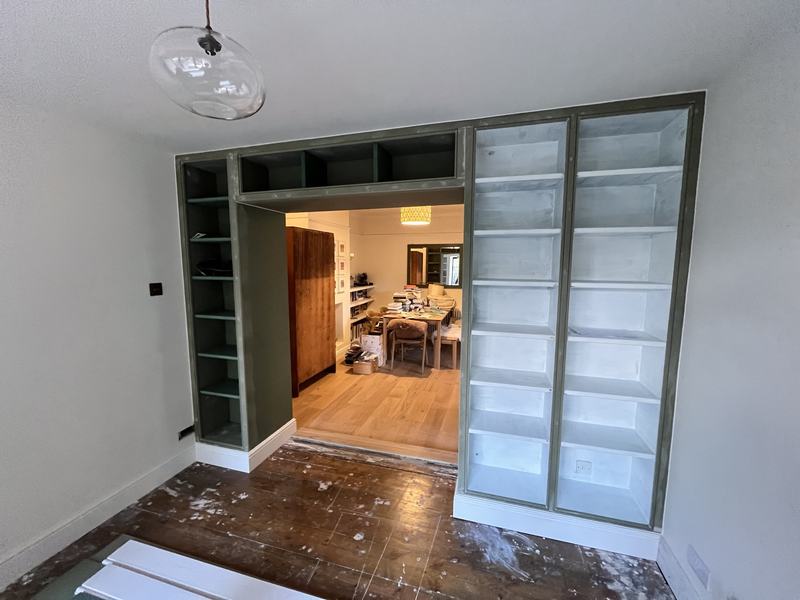 Decoration: The shelving around the opening painted.